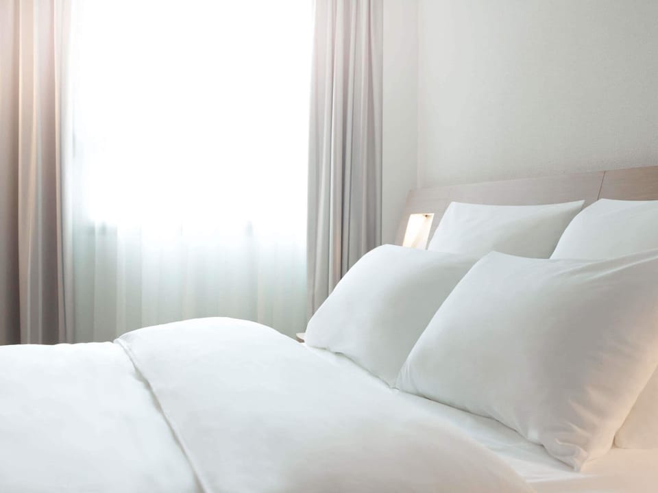 Premium bedding, memory foam beds, minibar, in-room safe
