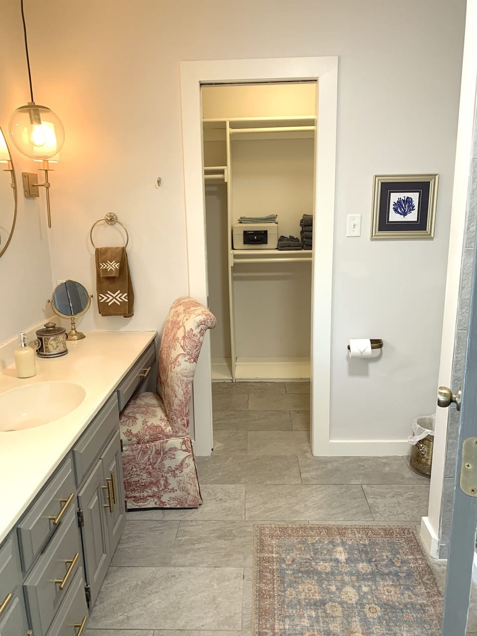 Comfortable en suite master bathroom with make up area and walk-in closet.