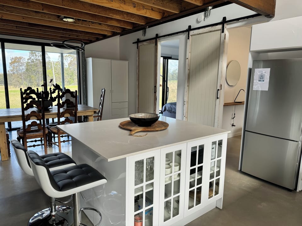 Kitchen Island for Prep and Possibly Breakfast meals. Bathed in natural light. 