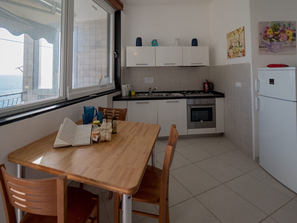 Apartment, 3 Bedrooms, Terrace, Sea View | Private kitchen | Full-size fridge, microwave, oven, stovetop