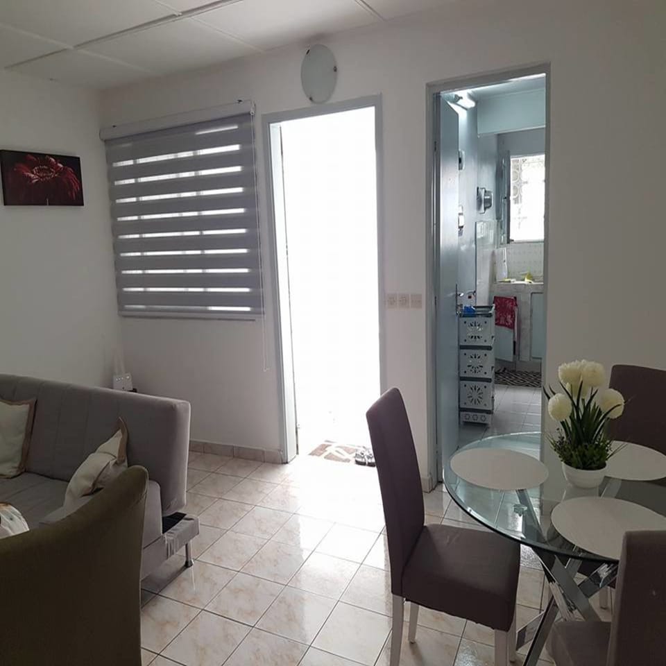 Comfort Townhome, 2 Bedrooms | Living area | Flat-screen TV