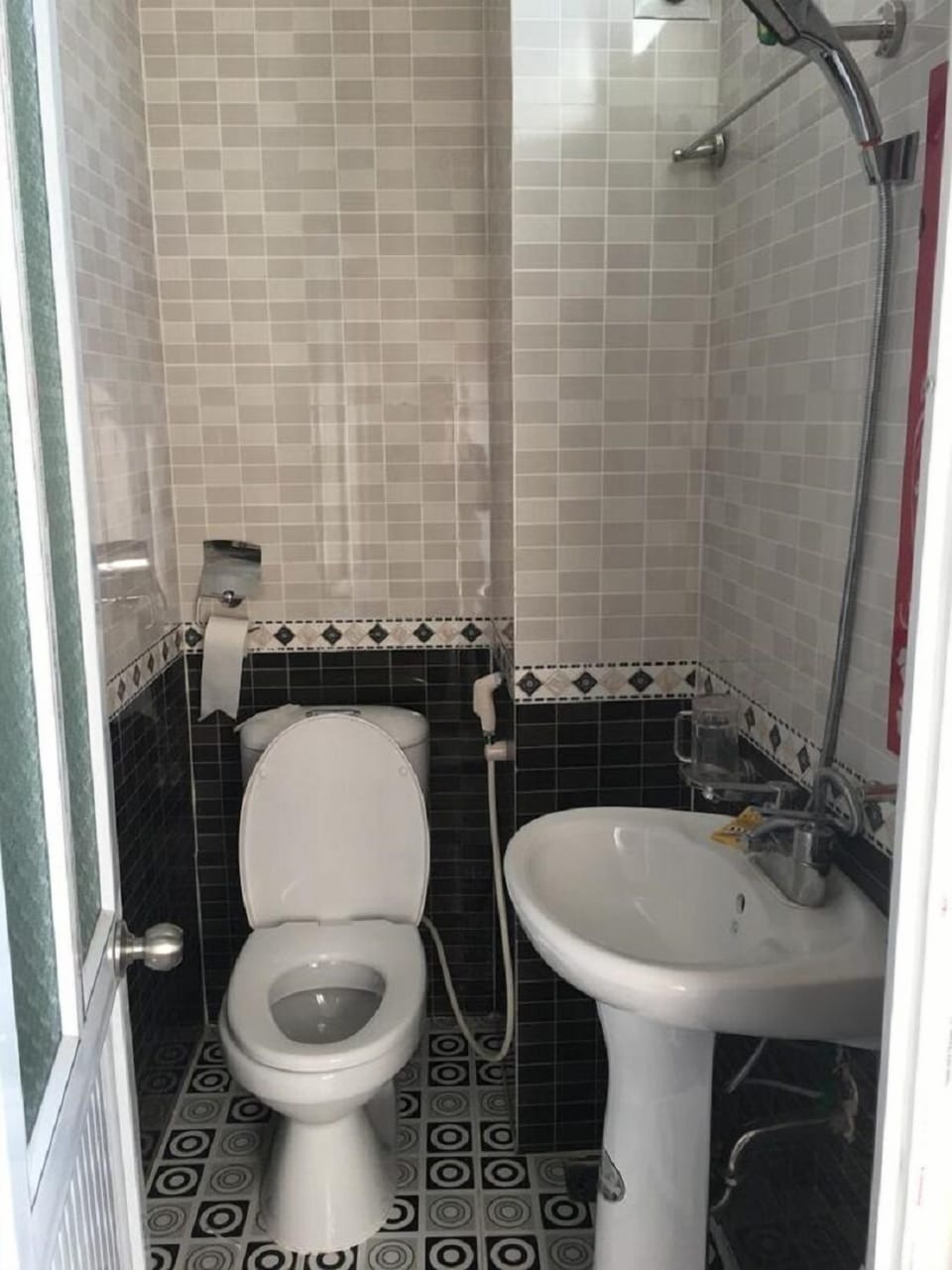Shower, free toiletries, hair dryer, slippers