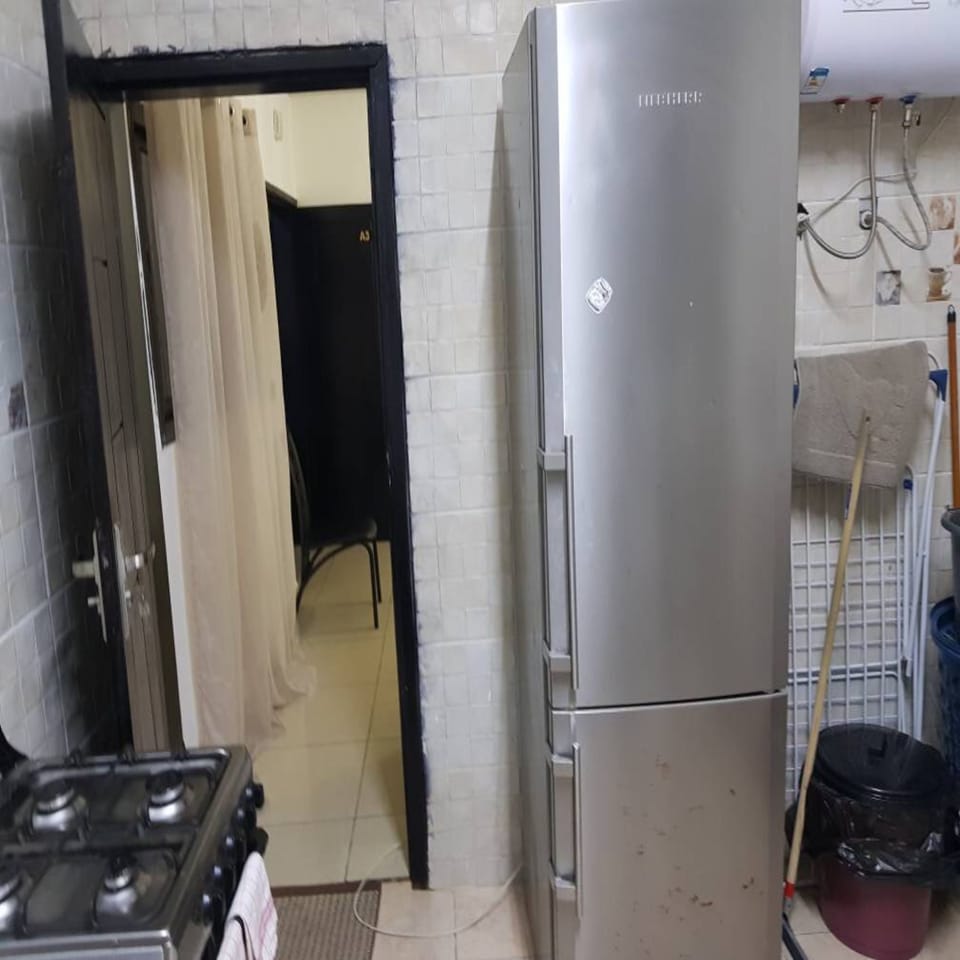 Apartment | Private kitchen | Coffee/tea maker, full-size fridge, microwave, oven