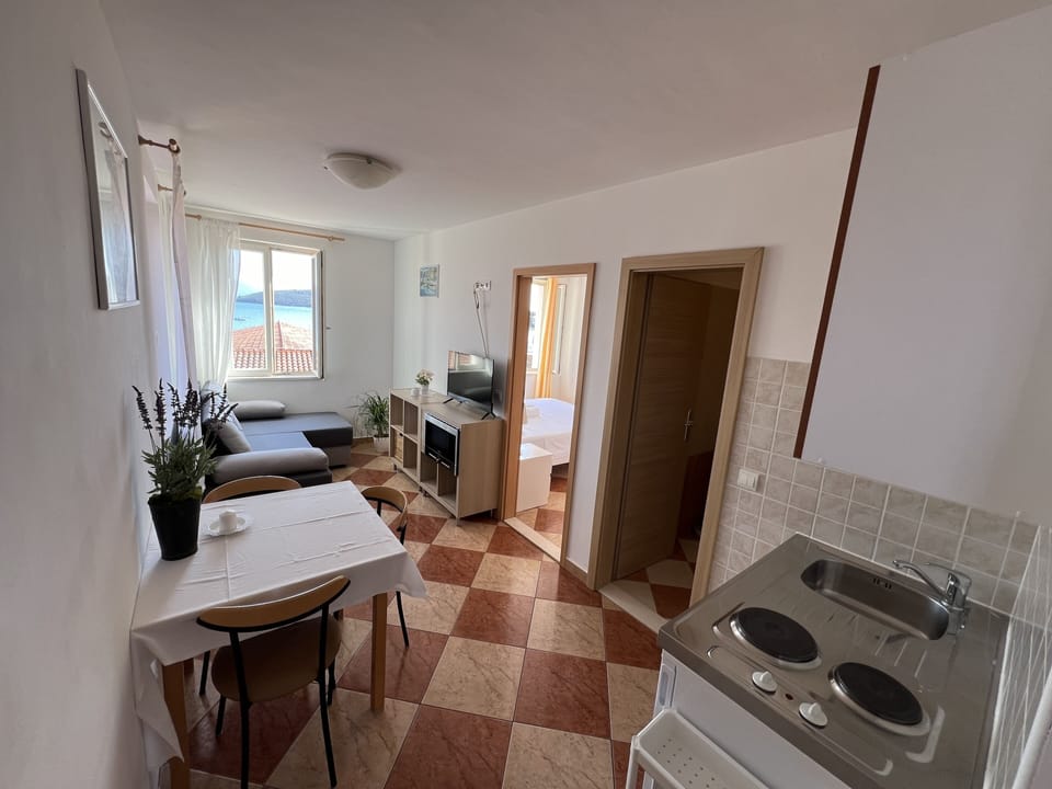 Apartment, 1 Bedroom, Sea View | Private kitchen | Fridge, electric kettle