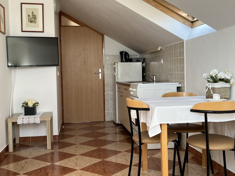Apartment, 1 Bedroom (Attic) | Private kitchen | Fridge, electric kettle