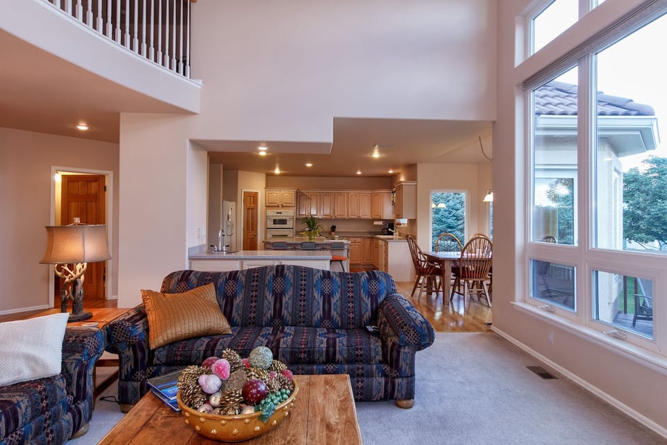 Great Room looking into kitchen.  Nice for entertaining.  Window wall to right. 