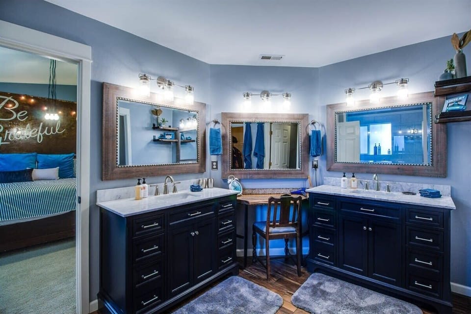 Large Master Bath with double vanities and private water closet.