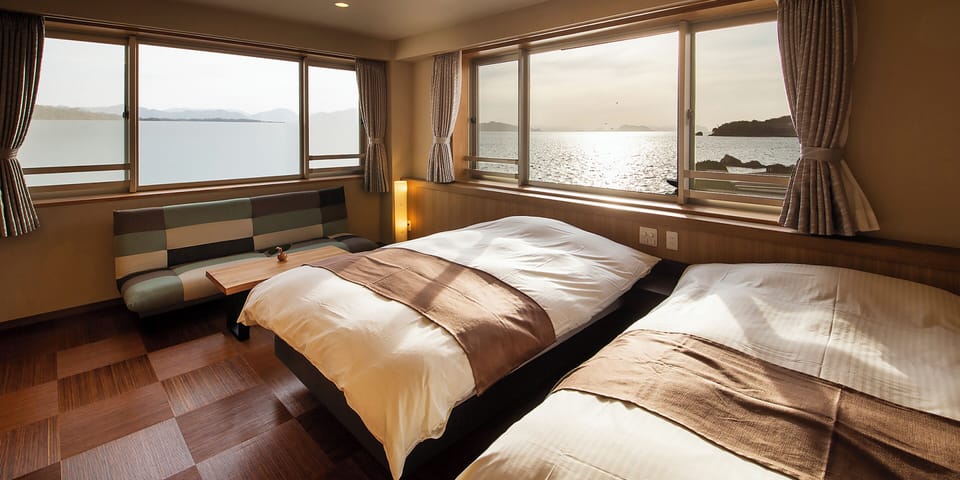 Premium Twin Room, Sauna, Ocean View | In-room safe, WiFi (free), bed sheets