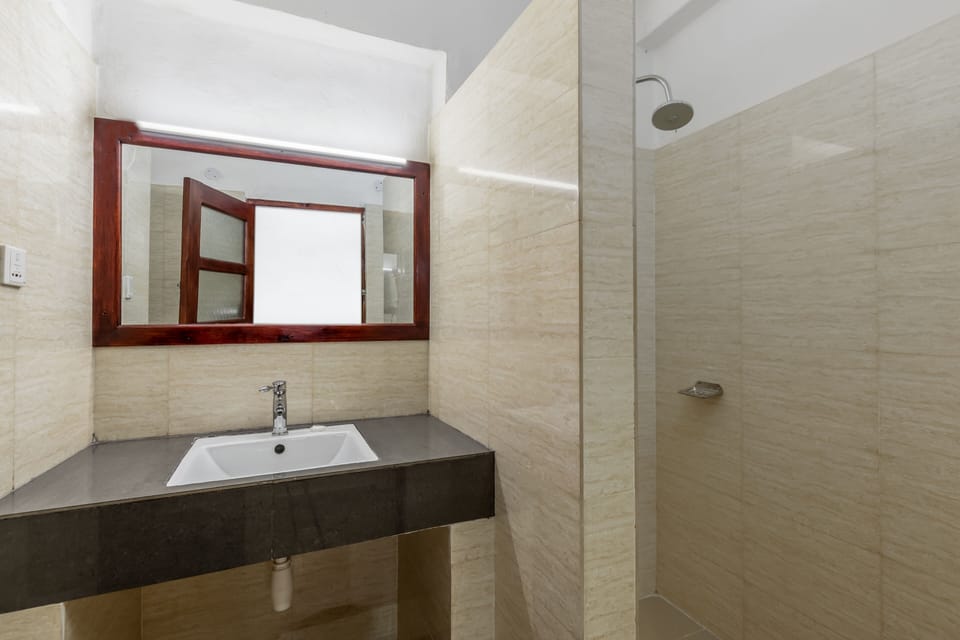 Shower, free toiletries, slippers, towels