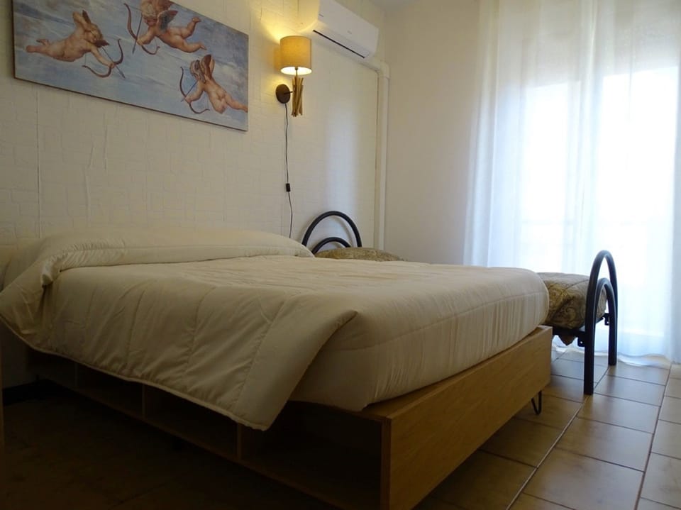 Twin Room, 2 Twin Beds, Shared Bathroom, City View | Premium bedding, desk, iron/ironing board, bed sheets