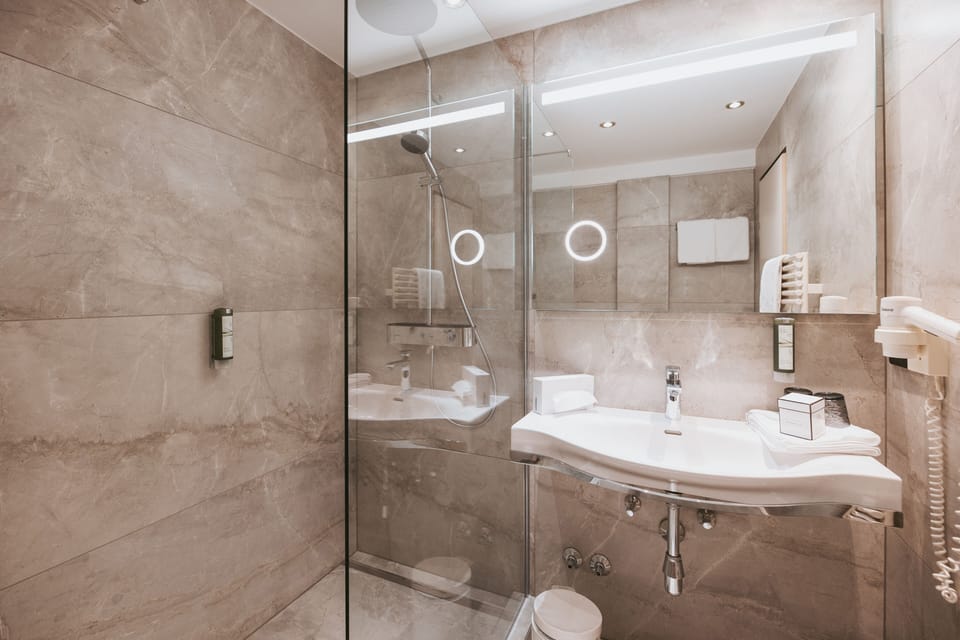 Comfort Double Room, Balcony | Bathroom | Shower, free toiletries, hair dryer, bathrobes
