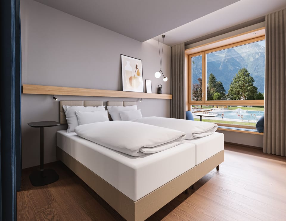 Single Room | Premium bedding, desk, blackout drapes, cribs/infant beds
