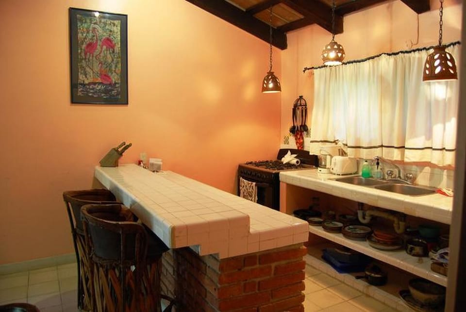 Traditional Townhome, 2 Bedrooms | Private kitchen | Fridge, microwave, oven, stovetop