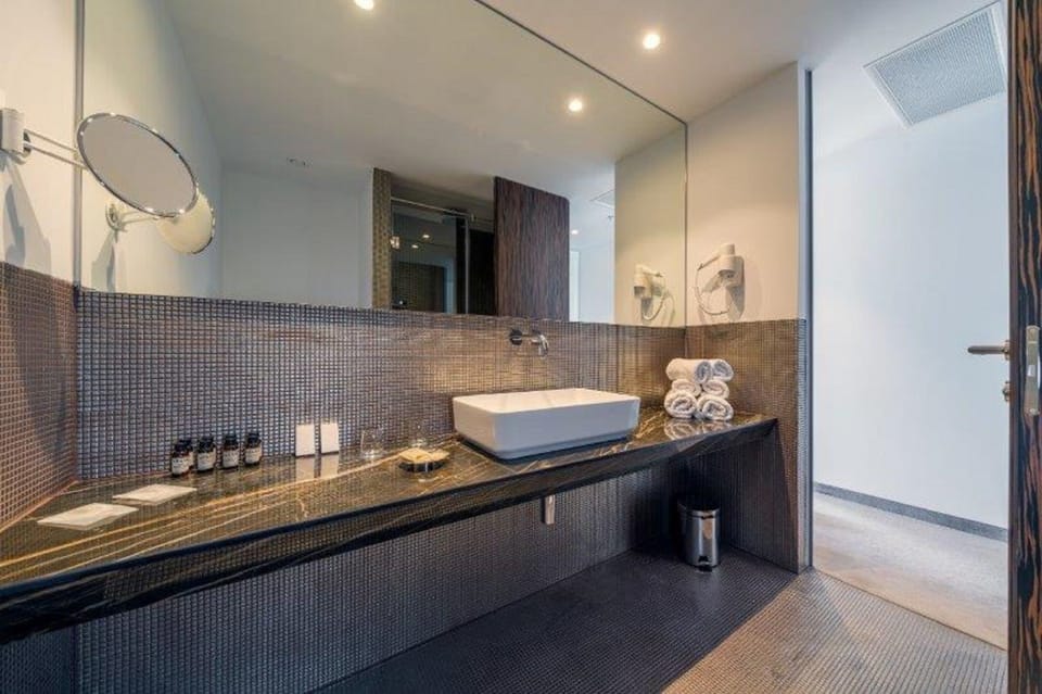 Shower, free toiletries, hair dryer, slippers