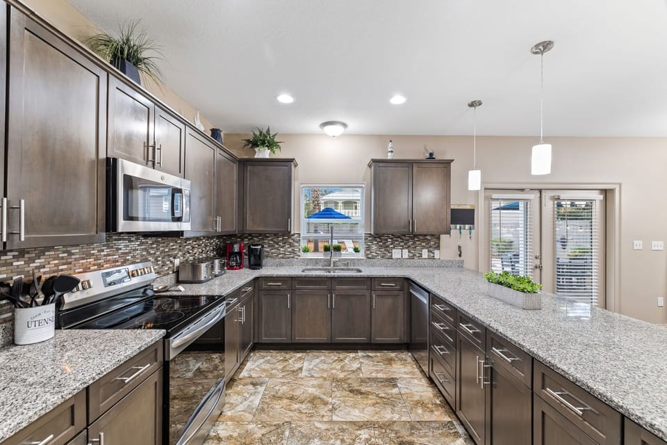 Your spacious, fully equipped kitchen where cooking, gathering, and conversation come naturally.