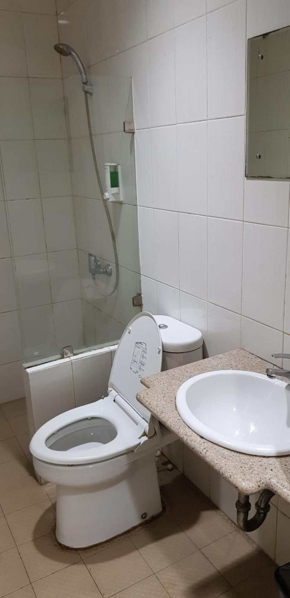 Shower, free toiletries, slippers, towels