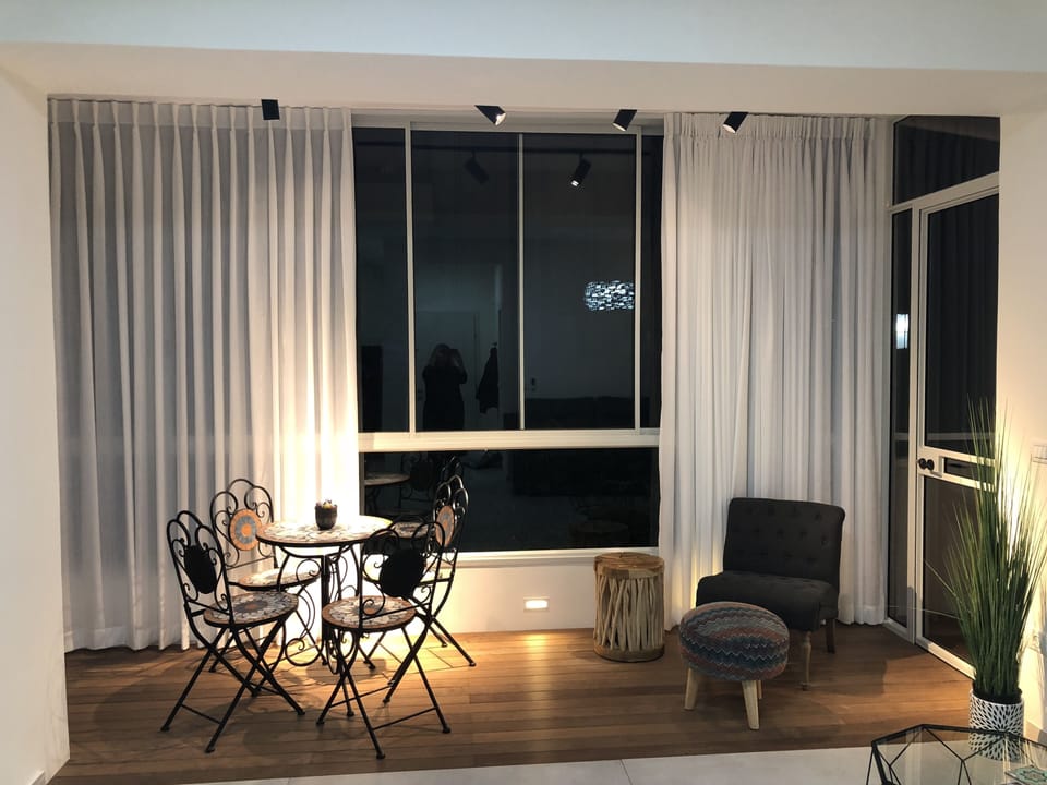 Deluxe Apartment, 3 Bedrooms | Living area | Flat-screen TV