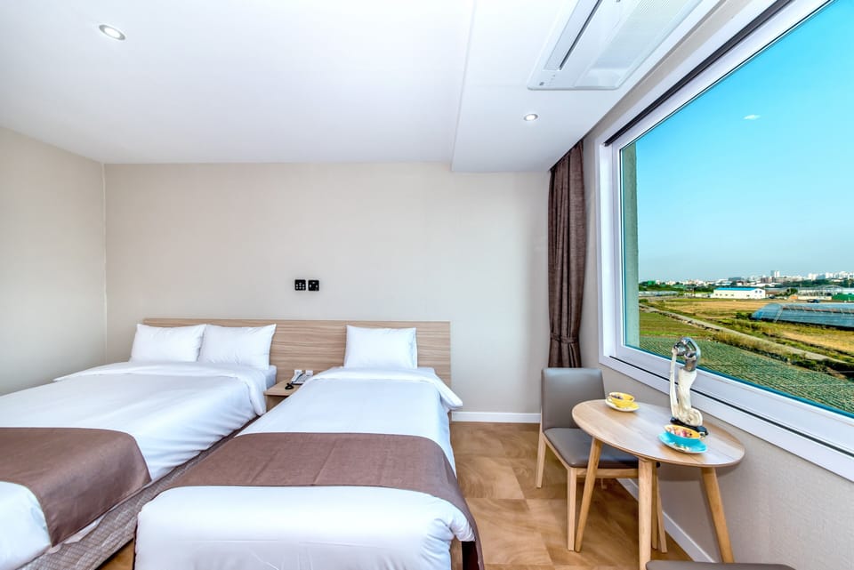 Deluxe Twin Room | Blackout drapes, soundproofing, free WiFi, bed sheets