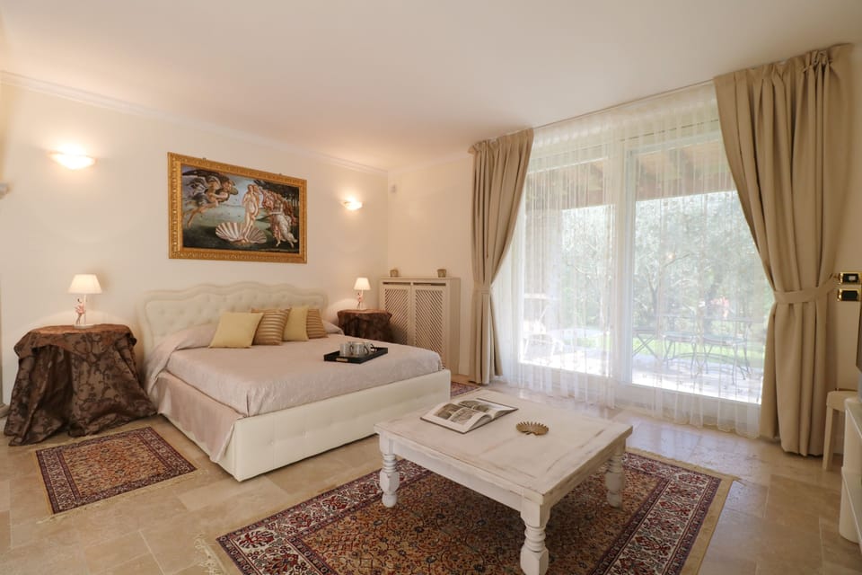 Superior Suite, Garden View | 1 bedroom, premium bedding, minibar, in-room safe