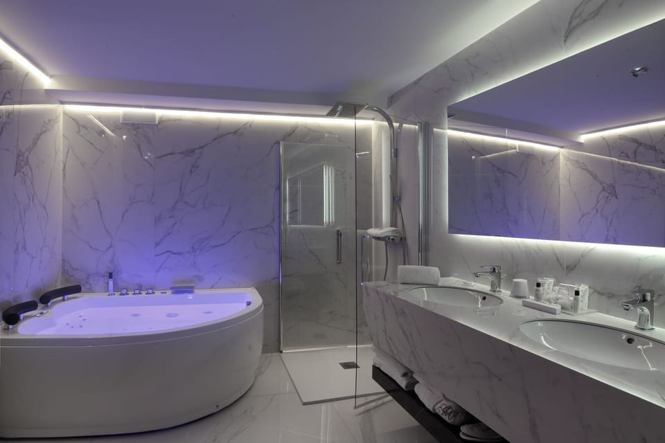 Shower, free toiletries, hair dryer, bathrobes