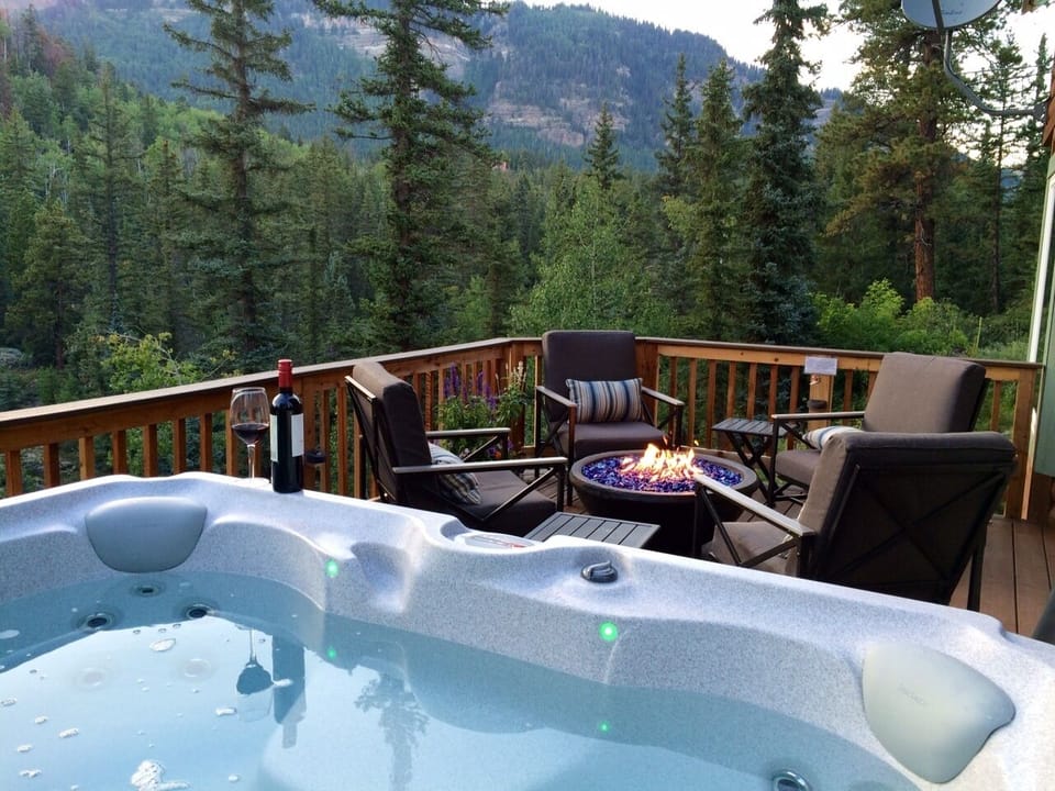 Hot tub and deck overlooking the valley and cascade creek
