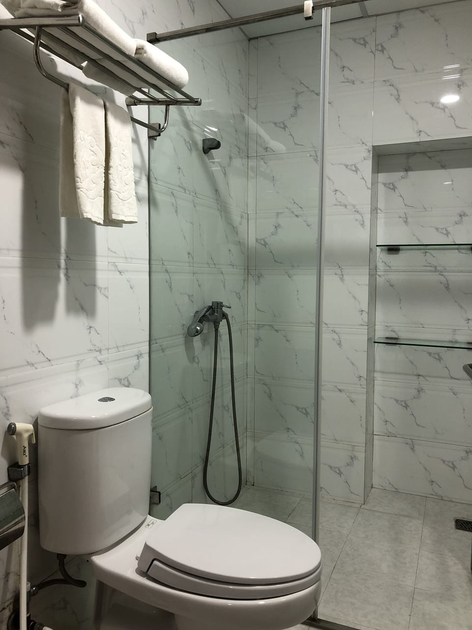 Shower, free toiletries, hair dryer, slippers