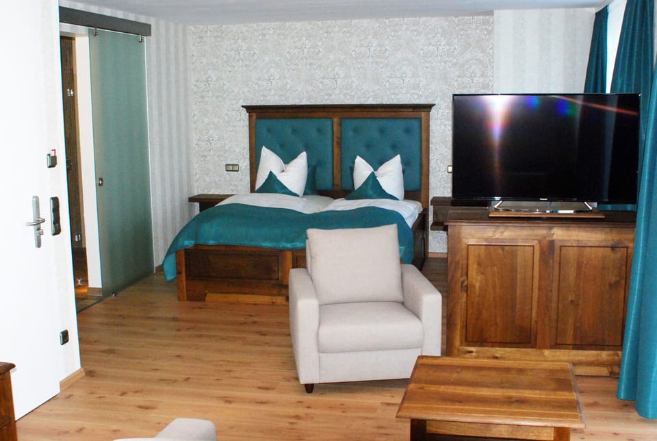 Desk, blackout drapes, rollaway beds (surcharge), WiFi (free)