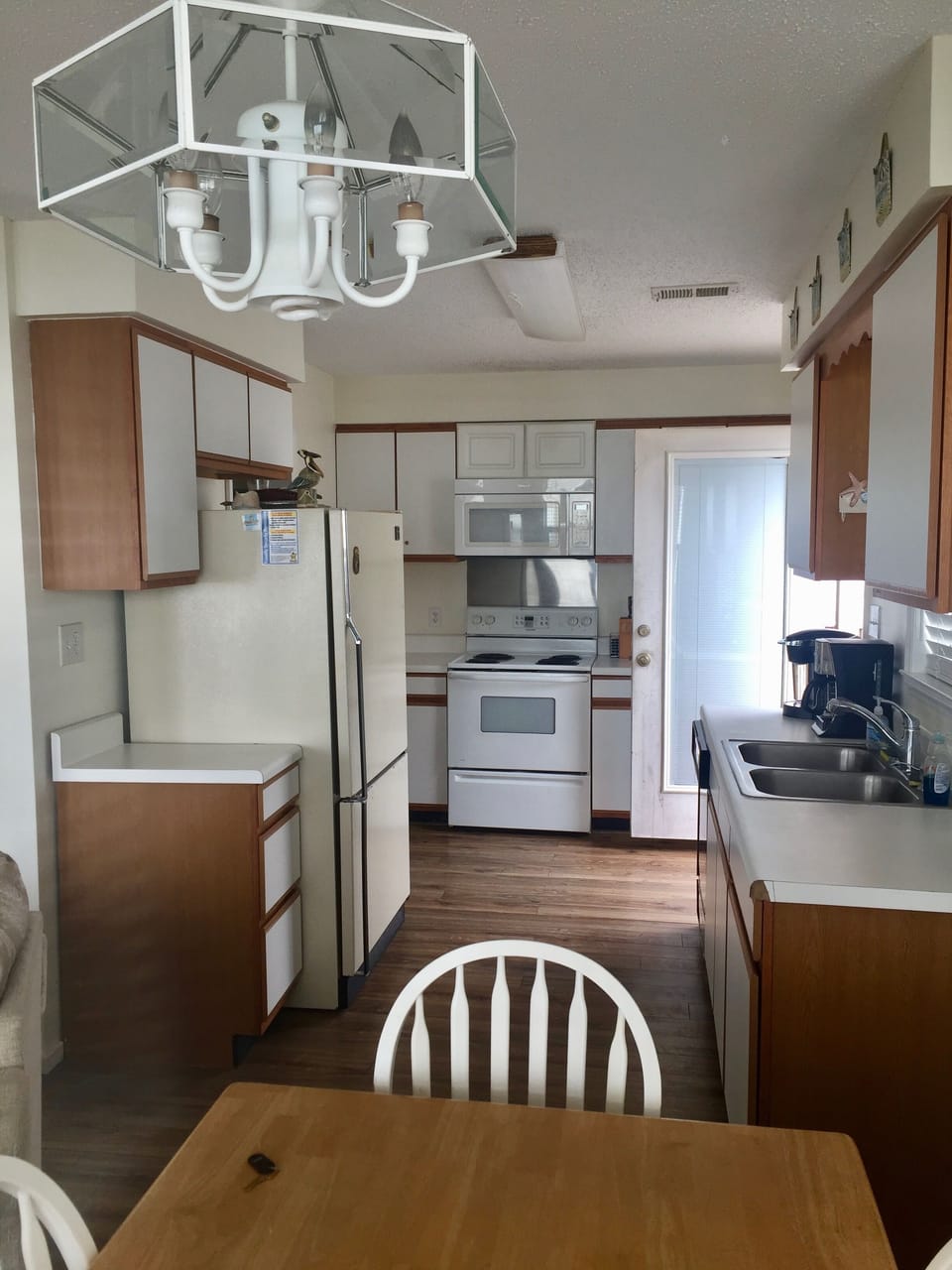 Kitchen furnished with everything but the food.