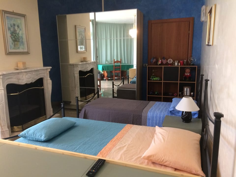 Quadruple Room, Private Bathroom | Desk, WiFi (free), bed sheets