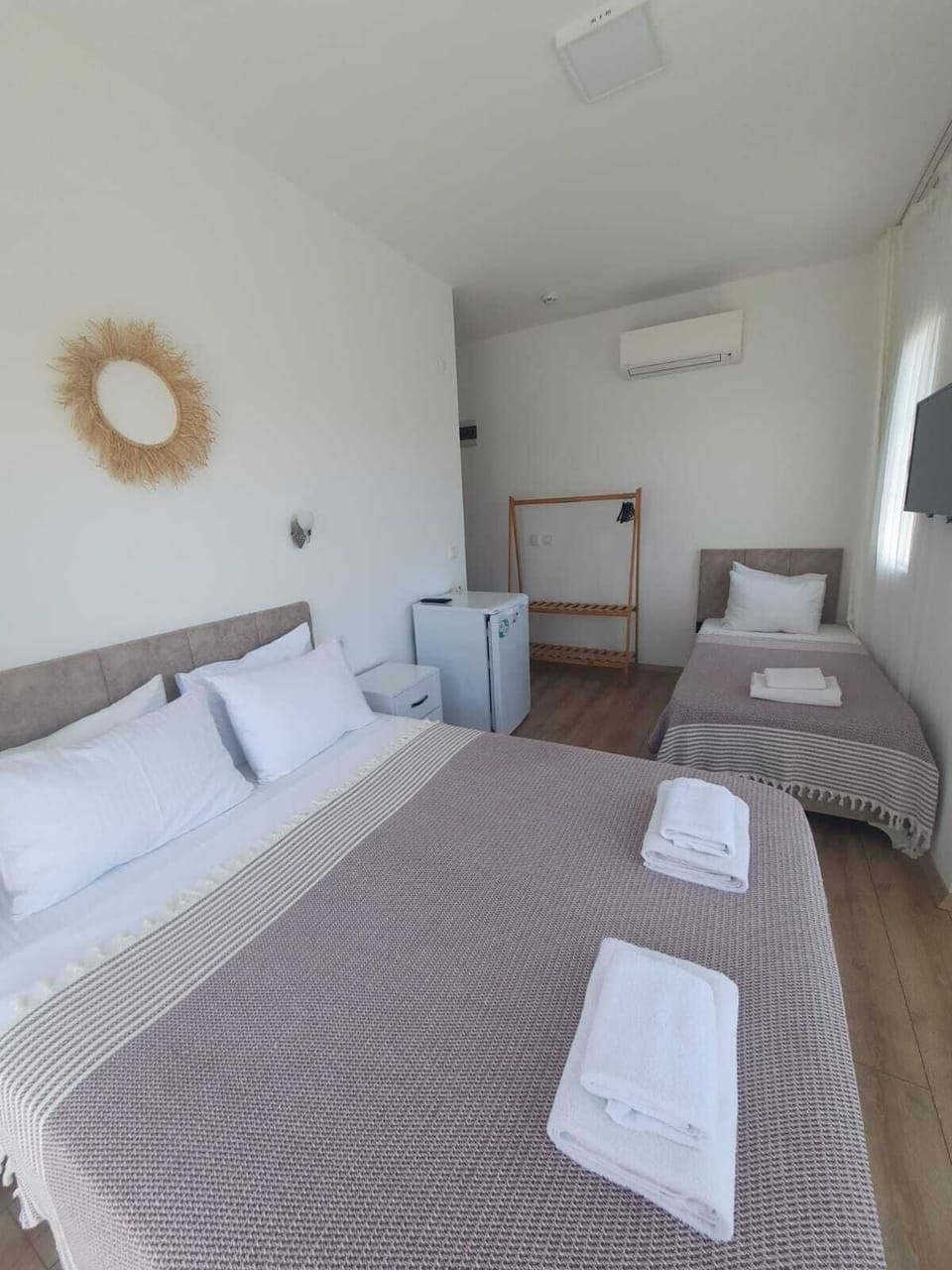 Triple Room | Premium bedding, in-room safe, iron/ironing board, free WiFi