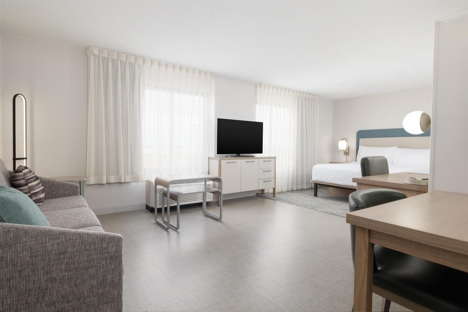 Premium bedding, desk, blackout drapes, iron/ironing board