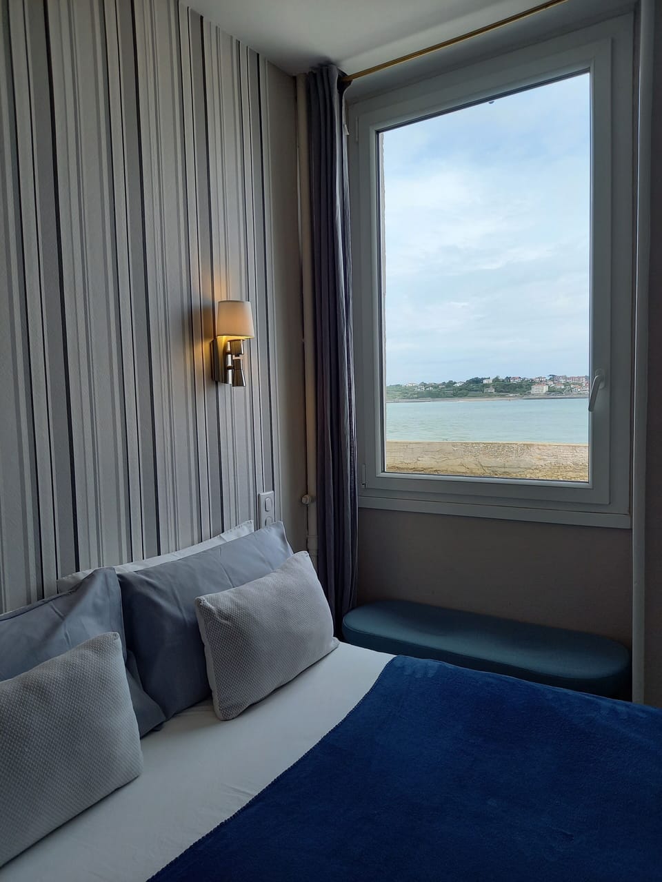 Blackout drapes, soundproofing, free WiFi, bed sheets
