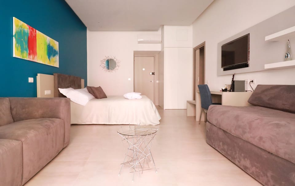 City Suite, Non Smoking, City View | Premium bedding, down comforters, in-room safe, individually decorated