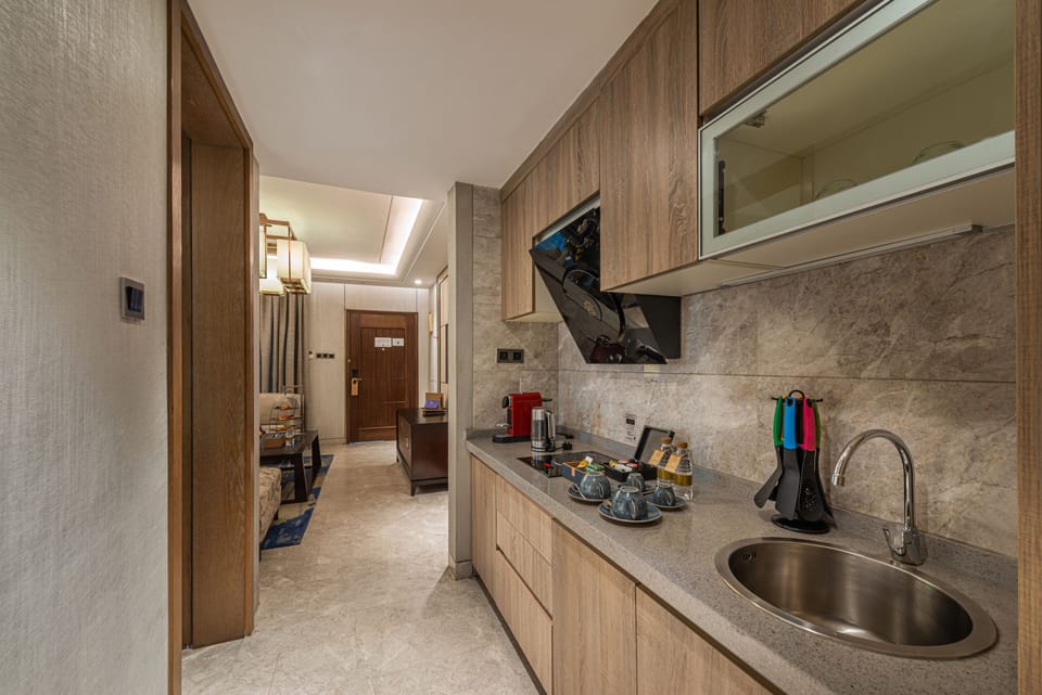 Junior Villa, 1 Bedroom, Jetted Tub | Private kitchen | Microwave, coffee/tea maker, electric kettle