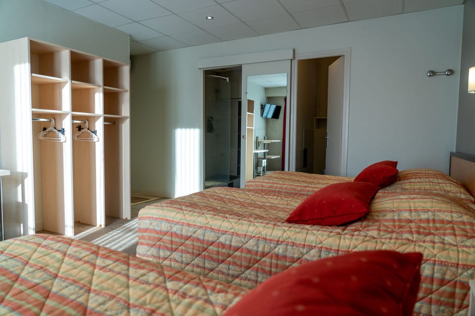 Triple Room | Premium bedding, in-room safe, desk, blackout drapes