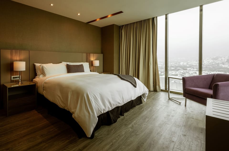 Junior Suite, 1 King Bed | Premium bedding, in-room safe, desk, iron/ironing board