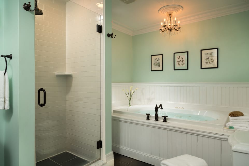 Deluxe King Room, Sitting Area, Private Bathroom, Jetted Tub, RM-1 | Bathroom | Combined shower/tub, free toiletries, hair dryer, bathrobes
