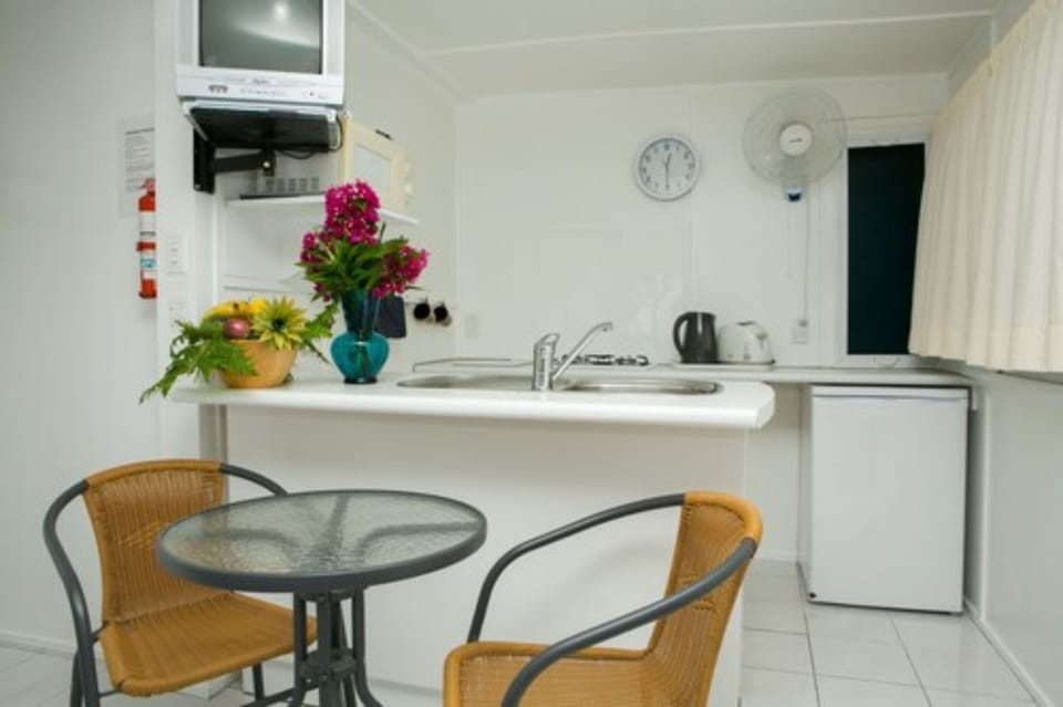Economy Studio, Beachfront | Private kitchenette | Coffee/tea maker, fridge, microwave, stovetop
