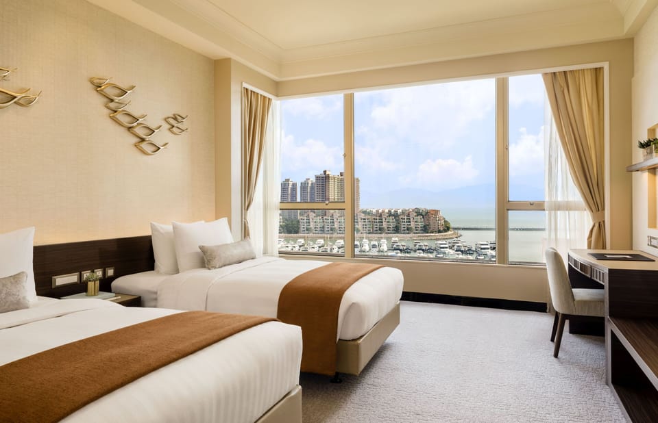 Deluxe Twin Room, Sea View | In-room safe, individually decorated, individually furnished, desk