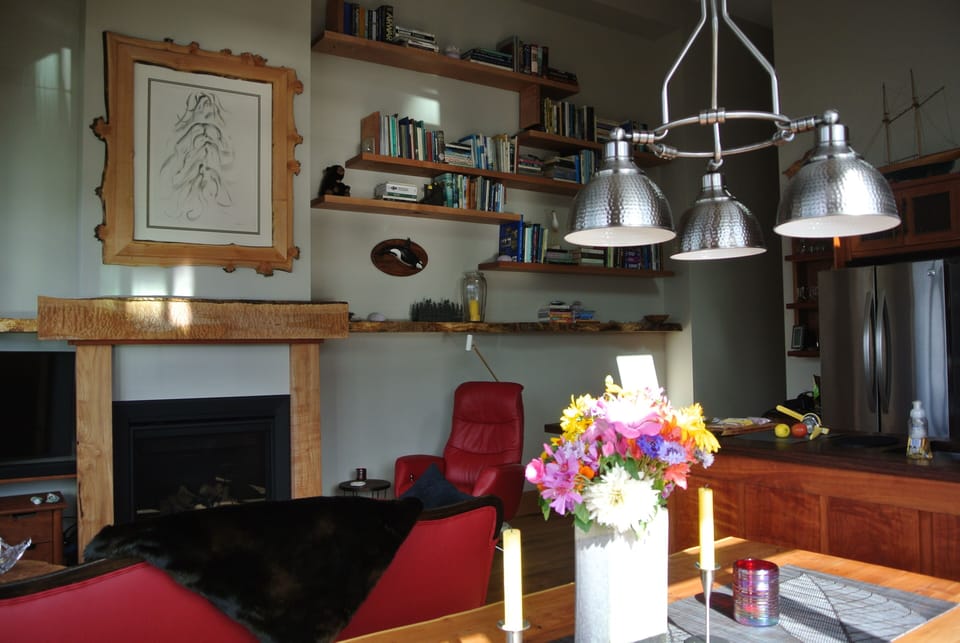 Books galore. Relax in the living room in front of the gas fireplace.