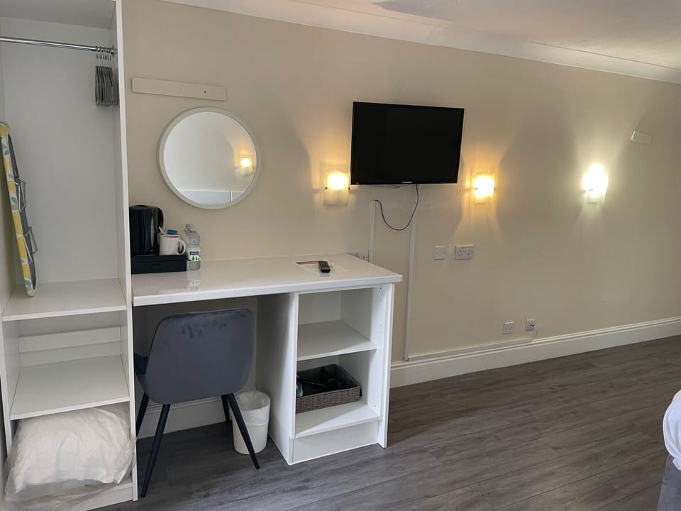 Standard Room (Family of 4) | Desk, iron/ironing board, free WiFi, bed sheets