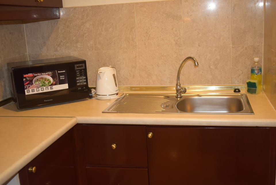 Junior Suite | Private kitchen | Fridge, microwave, dishwasher, coffee/tea maker