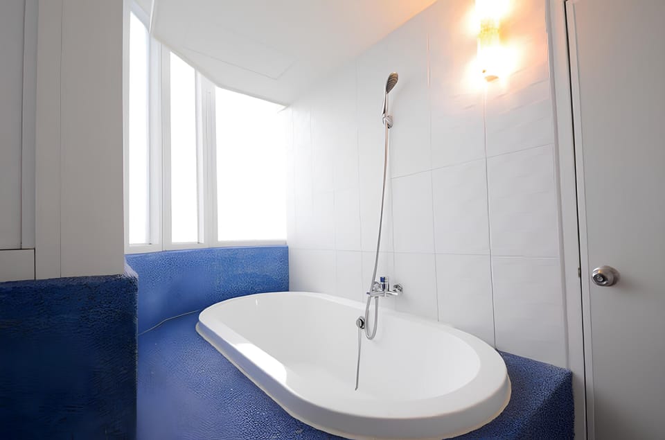 Family Quadruple Room, Non Smoking | Bathroom | Hair dryer, slippers, towels, soap