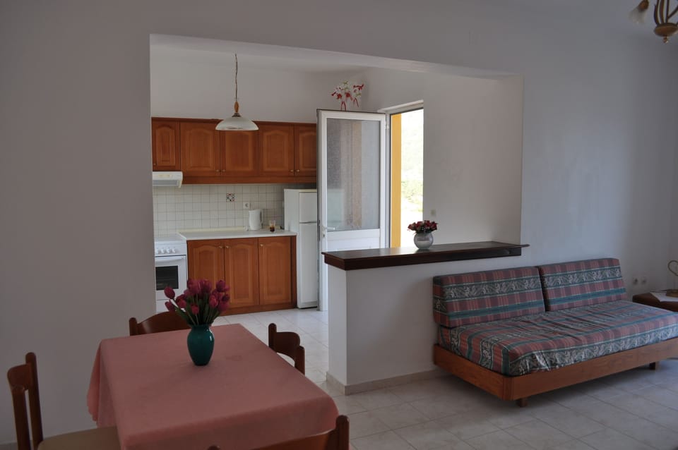 Family House, 1 Bedroom | Living area | Flat-screen TV