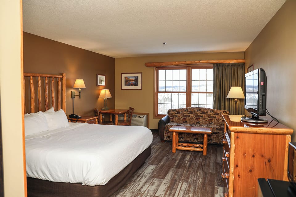 Deluxe Room, 1 King Bed with Sofa bed, Lake View | Pillowtop beds, desk, iron/ironing board, free cribs/infant beds