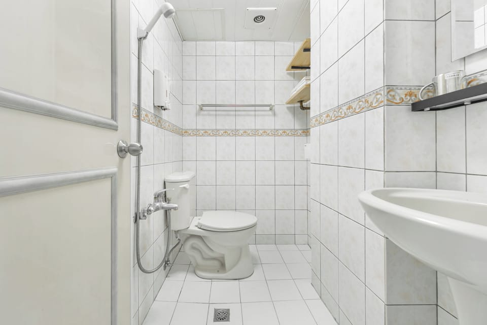 Two-Bedroom Suite | Bathroom | Shower, hair dryer, slippers, towels