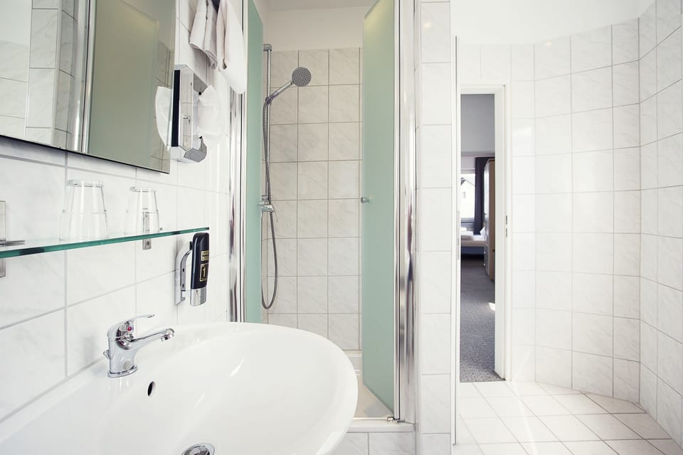 Shower, free toiletries, hair dryer, towels