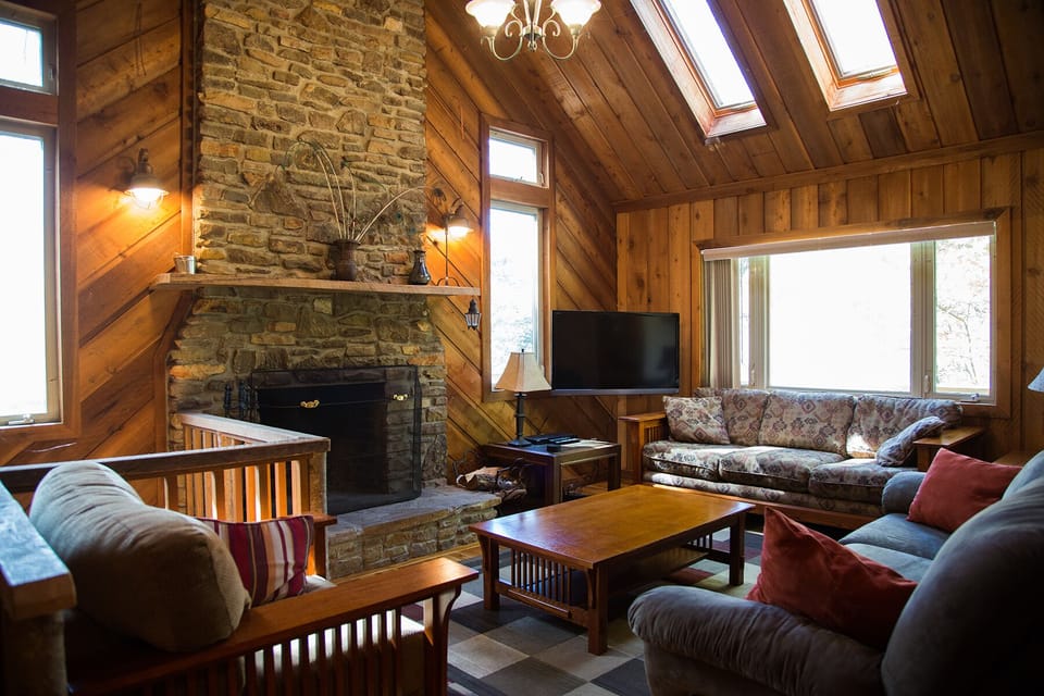 Natural Teak Floors, Stone Fireplace, and Fine Furnishings incl Flat Screen TV