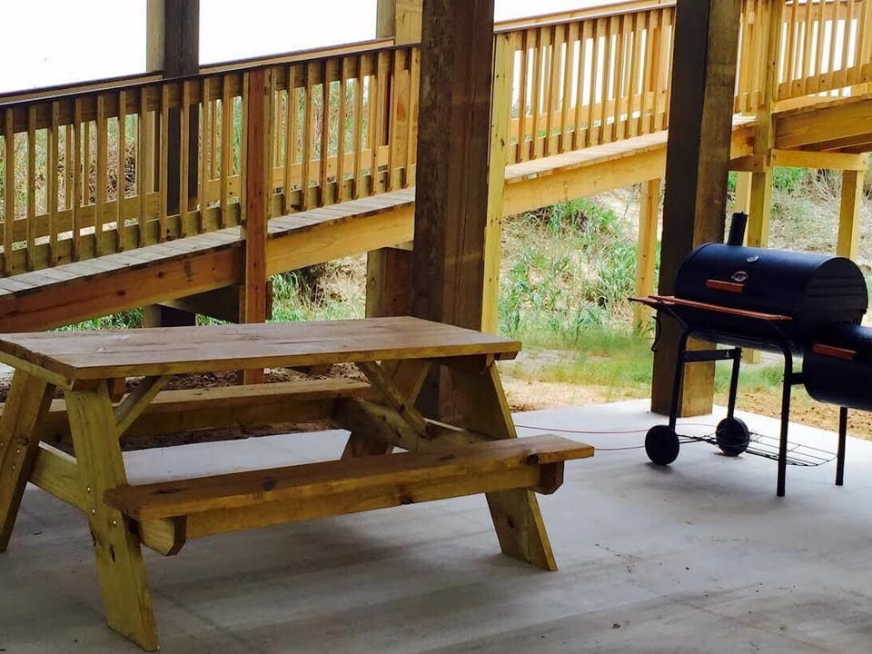 More picnic area underneath the house.
