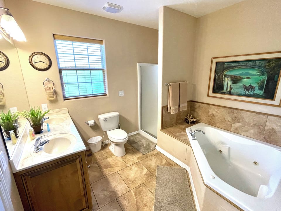 Master bath en suite master bedroom. Dual sinks, jacuzzi tub, shower